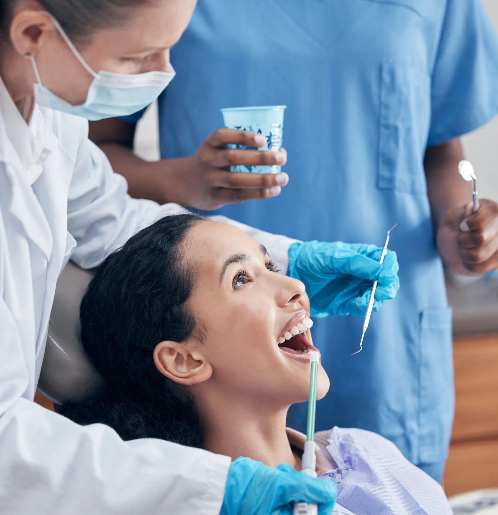 Patient receiving a dental exam at Edge Dental Designs, a dentist serving Prosper, TX